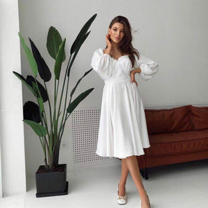 New French Style Temperament Elegant Bow Sweet Vacation Style Design Puff Sleeve Large Swing Dress