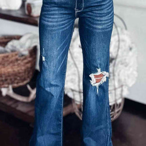 Asymmetrical Open Knee Distressed Flare Jeans