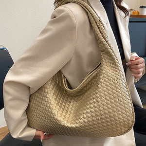 French high-end woven bag, versatile shoulder armpit bag, niche texture portable commuter bag