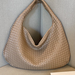 French high-end woven bag, versatile shoulder armpit bag, niche texture portable commuter bag