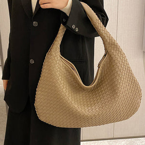 French high-end woven bag, versatile shoulder armpit bag, niche texture portable commuter bag