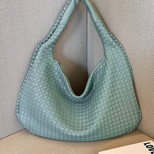 French high-end woven bag, versatile shoulder armpit bag, niche texture portable commuter bag