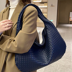 French high-end woven bag, versatile shoulder armpit bag, niche texture portable commuter bag