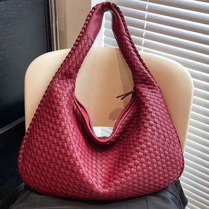 French high-end woven bag, versatile shoulder armpit bag, niche texture portable commuter bag