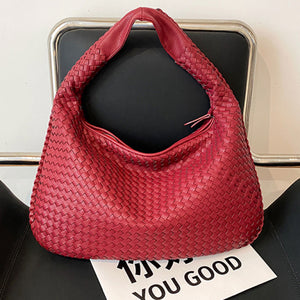 French high-end woven bag, versatile shoulder armpit bag, niche texture portable commuter bag