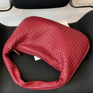 French high-end woven bag, versatile shoulder armpit bag, niche texture portable commuter bag