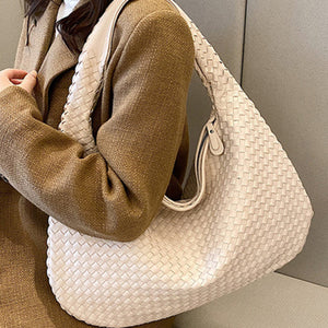 French high-end woven bag, versatile shoulder armpit bag, niche texture portable commuter bag